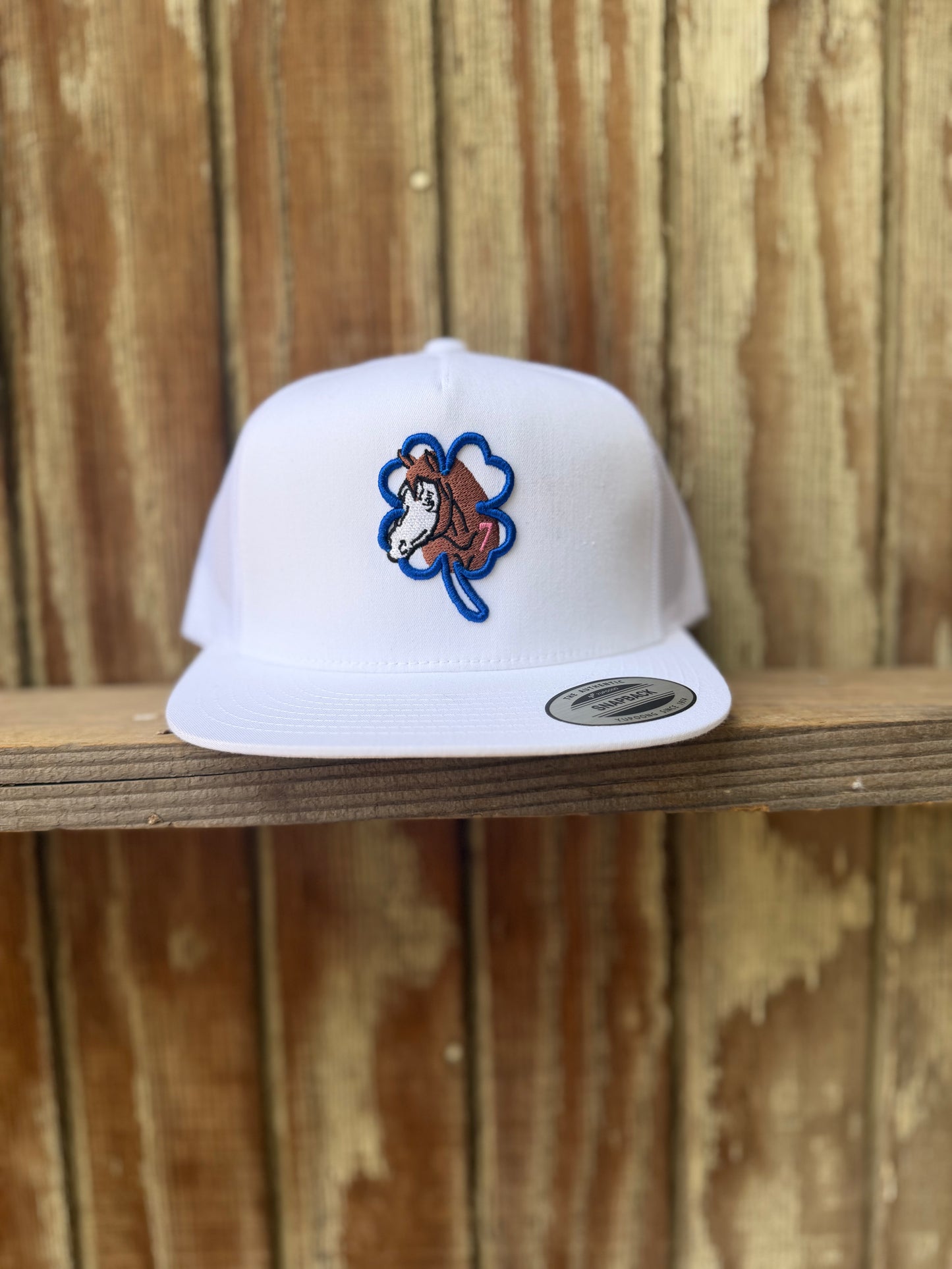 White cap Navy blue clover brown horse pink 7