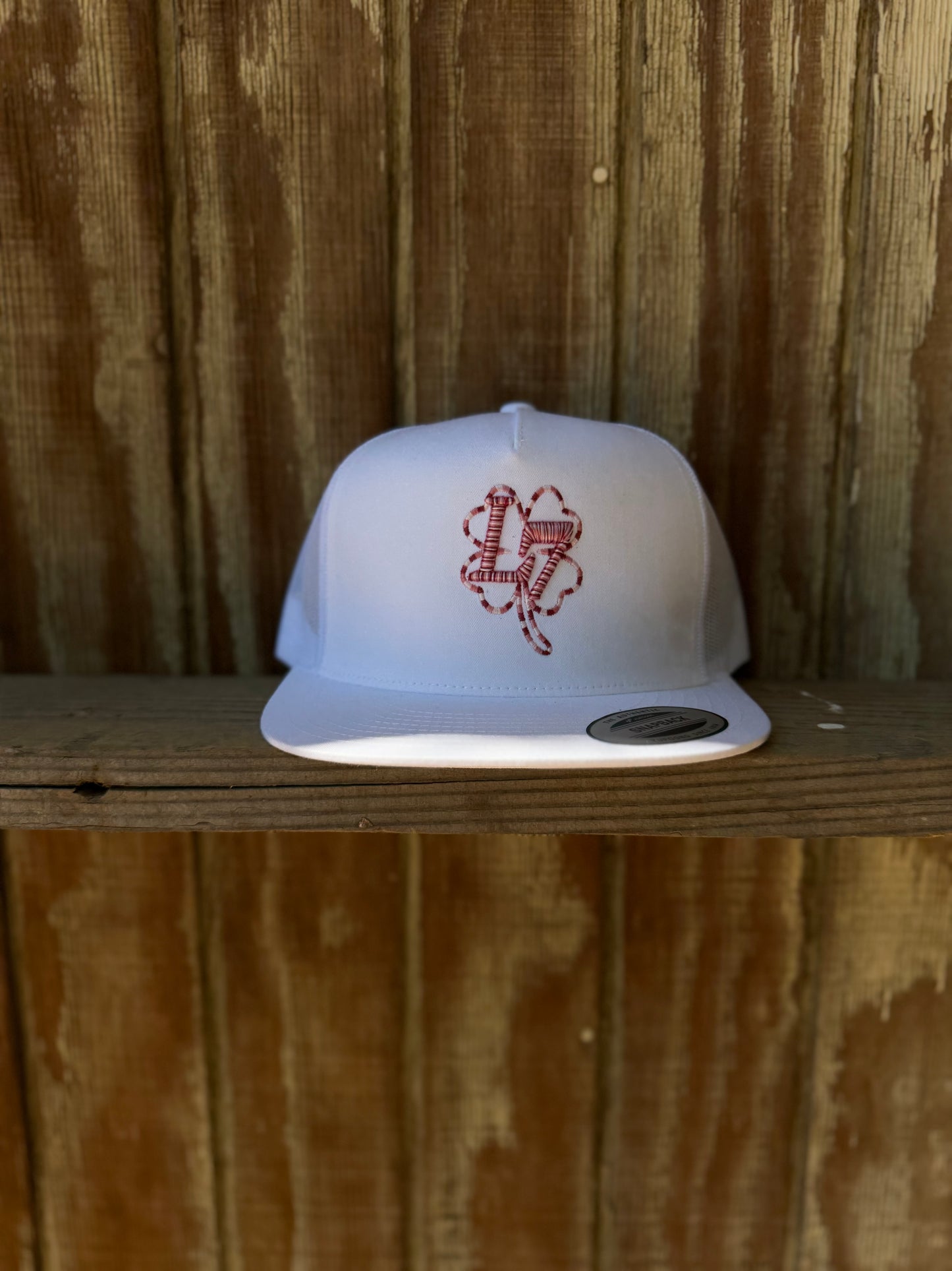 L7 Logo white cap pink logo color